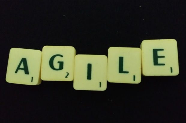 Scrabble letters spelling out the word 'agile'