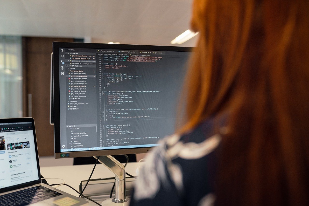 Image of woman sitting at a computer