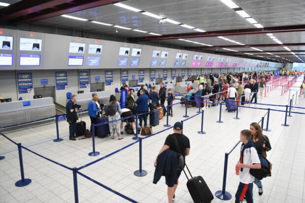 An image of checking-in desks at an airport