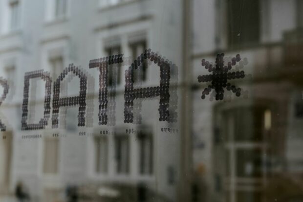 An image of the word 'Data' reflected in a window